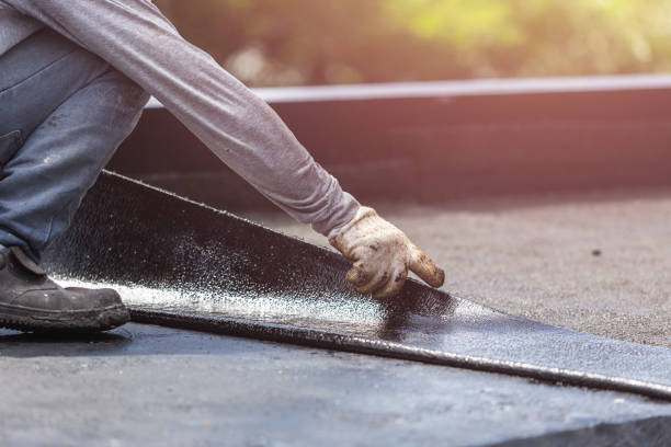 Professional Exterior Waterproofing technician working in Falmouth, KY
